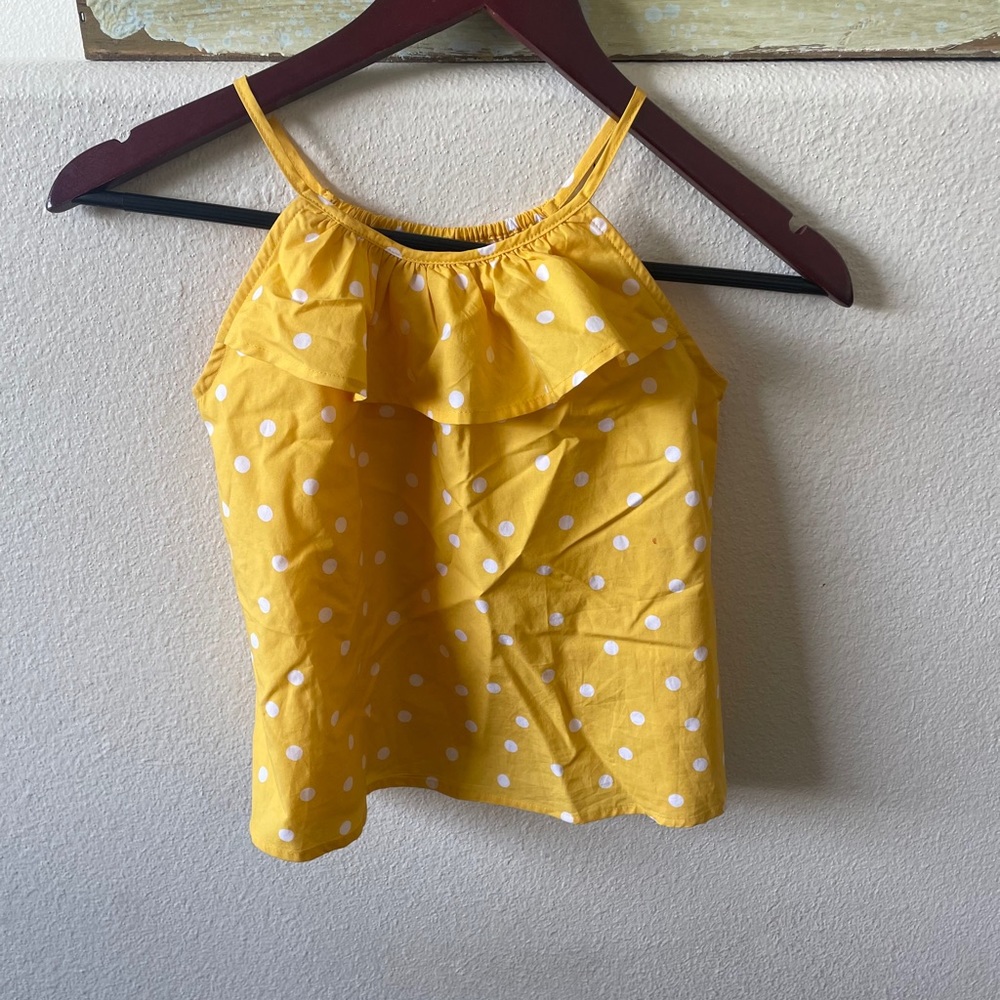 Yellow and white polka dot tank top